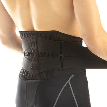Image of a man wearing the LumbarMax back brace.